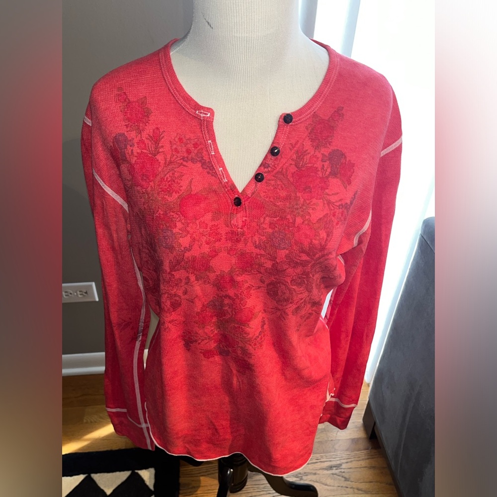 Red/pink shirt trimmed with white stitching.  Made by cut cute. Size xl.